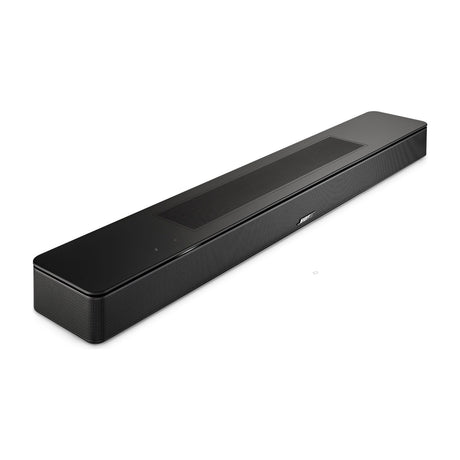 Bose Smart Soundbar with Dolby Atmos and AI Dialogue Mode — Bose Smart Soundbar in black, straight-on front view showing the wrap-around metal grille and slim profile on a plain background