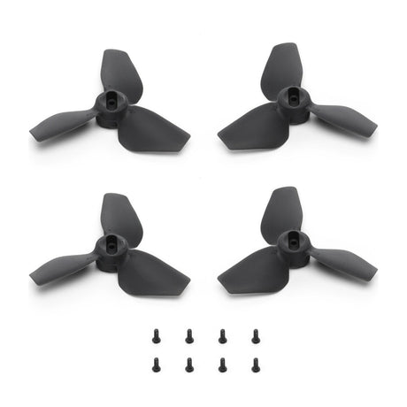 DJI Neo Propellers, 2 Pairs with Mounting Screws — Set of DJI Neo propellers, four small grey blades laid out flat with the mounting screws, on a plain background