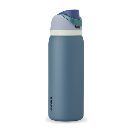 Owala FreeSip Insulated Stainless Steel Water Bottle, 24 oz — Owala FreeSip 24 oz insulated water bottle standing upright with the lid closed and carry loop visible, straight-on product view