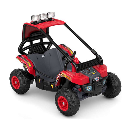 Power Wheels Dune Racer Extreme 12V Battery-Powered Ride-On, 2-Seater — Power Wheels Dune Racer Extreme 12V two-seat ride-on in red and black, three-quarter front view, photographed outdoors