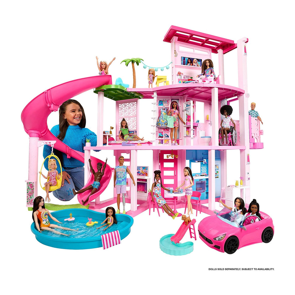Barbie Dreamhouse Playset, 3 Stories with Pool, Slide and Elevator, 75+ Pieces — Fully assembled pink Barbie Dreamhouse, three stories with pool and slide, front view on a white background