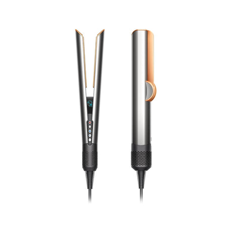 Dyson Airstrait Straightener — Dyson Airstrait straightener held upright with the two arms open, showing the air outlets along the inner edges, on a plain background