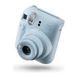 Fujifilm Instax Mini 12 Instant Film Camera — Fujifilm Instax Mini 12 instant camera, front three-quarter view showing the round lens barrel and selfie mirror