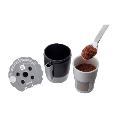 Keurig My K-Cup Universal Reusable Coffee Filter, MultiStream Technology — Keurig My K-Cup Universal reusable coffee filter, grey and black pod-shaped mesh basket with its lid, shown from the front