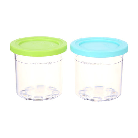 Ninja CREAMi Pints & Storage Lids, 2 Pack, XSKPLID2CD — Two clear Ninja CREAMi pint containers with lime and aqua lids standing side by side on a plain background