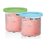 Ninja CREAMi Pints & Storage Lids, 2 Pack, XSKPLID2CD — Two clear Ninja CREAMi pint containers with lime and aqua lids standing side by side on a plain background