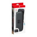 Nintendo Switch 2 Carrying Case & Screen Protector, Official Case with Six Game Card Slots — Official black Nintendo Switch 2 carrying case shown closed at a three-quarter angle, with the boxed screen protector beside it, plain white background