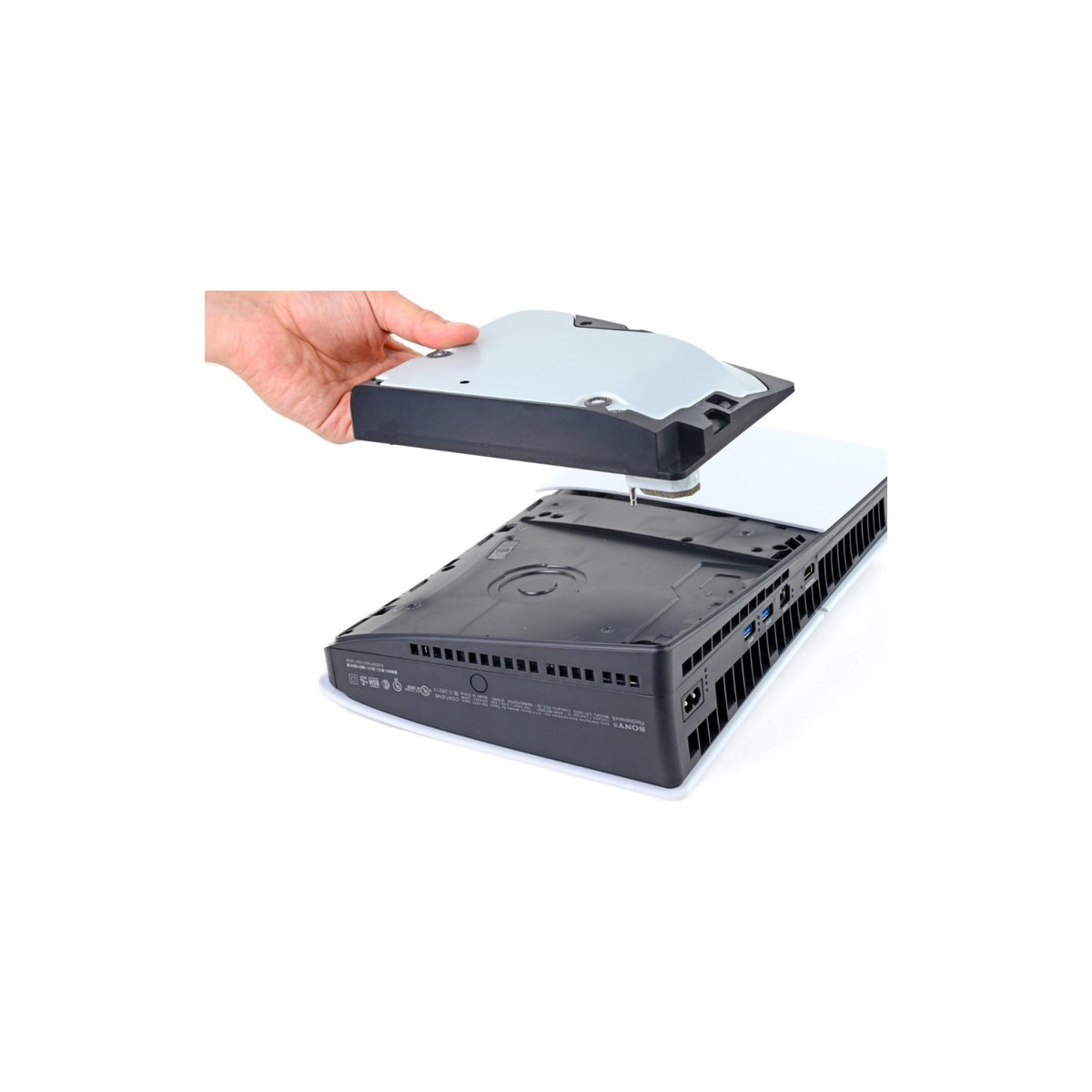 Sony PlayStation 5 Disc Drive for PS5 Digital Edition and PS5 Pro — The white Sony PlayStation 5 Disc Drive accessory shown on its own at a three-quarter angle, with the disc slot visible