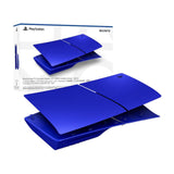 Sony PS5 Console Covers (model group - slim), Cobalt Blue — A pair of metallic cobalt blue PS5 Slim console covers fitted to a PS5 Slim standing upright, three-quarter front view