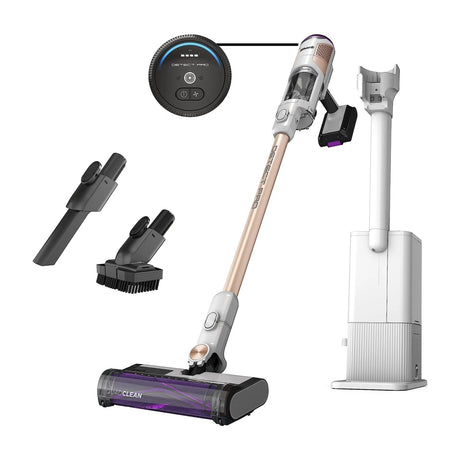 Shark Detect Pro Cordless Stick Vacuum with Auto-Empty System, IW3511 — Shark Detect Pro cordless stick vacuum in white and brass standing in its auto-empty charging dock, full height on a plain background