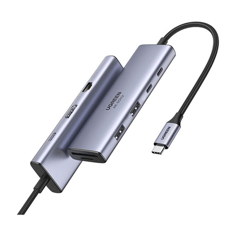 UGREEN Revodok Pro 109 9-in-1 USB-C Hub, 4K 60Hz HDMI, Gigabit Ethernet, 100W Charging — UGREEN Revodok Pro 109 grey metal USB-C hub with its braided cable coiled beside it, showing HDMI, Ethernet, USB-A ports and card slots, on a plain background